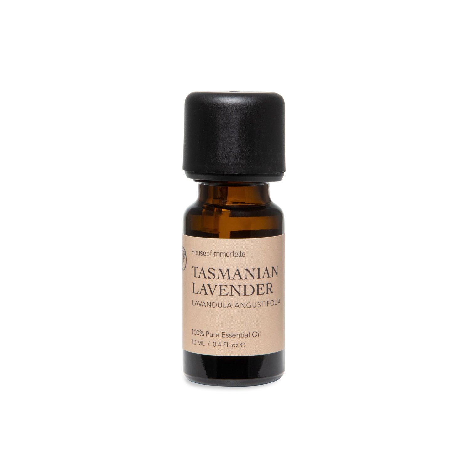 Glass bottle of Tasmanian lavender essential oil with a lavender-colored label, surrounded by sprigs of fresh lavender flowers and soft green leaves, highlighting its calming and soothing properties