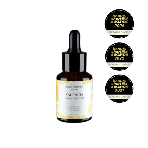 House of Immortelle Valencia Heavenly Face Serum in a sleek, elegant bottle, featuring a lightweight formula designed to hydrate and nourish the skin. The serum is infused with natural ingredients, offering a glowing, refreshed complexion, and is ideal for daily skincare routines