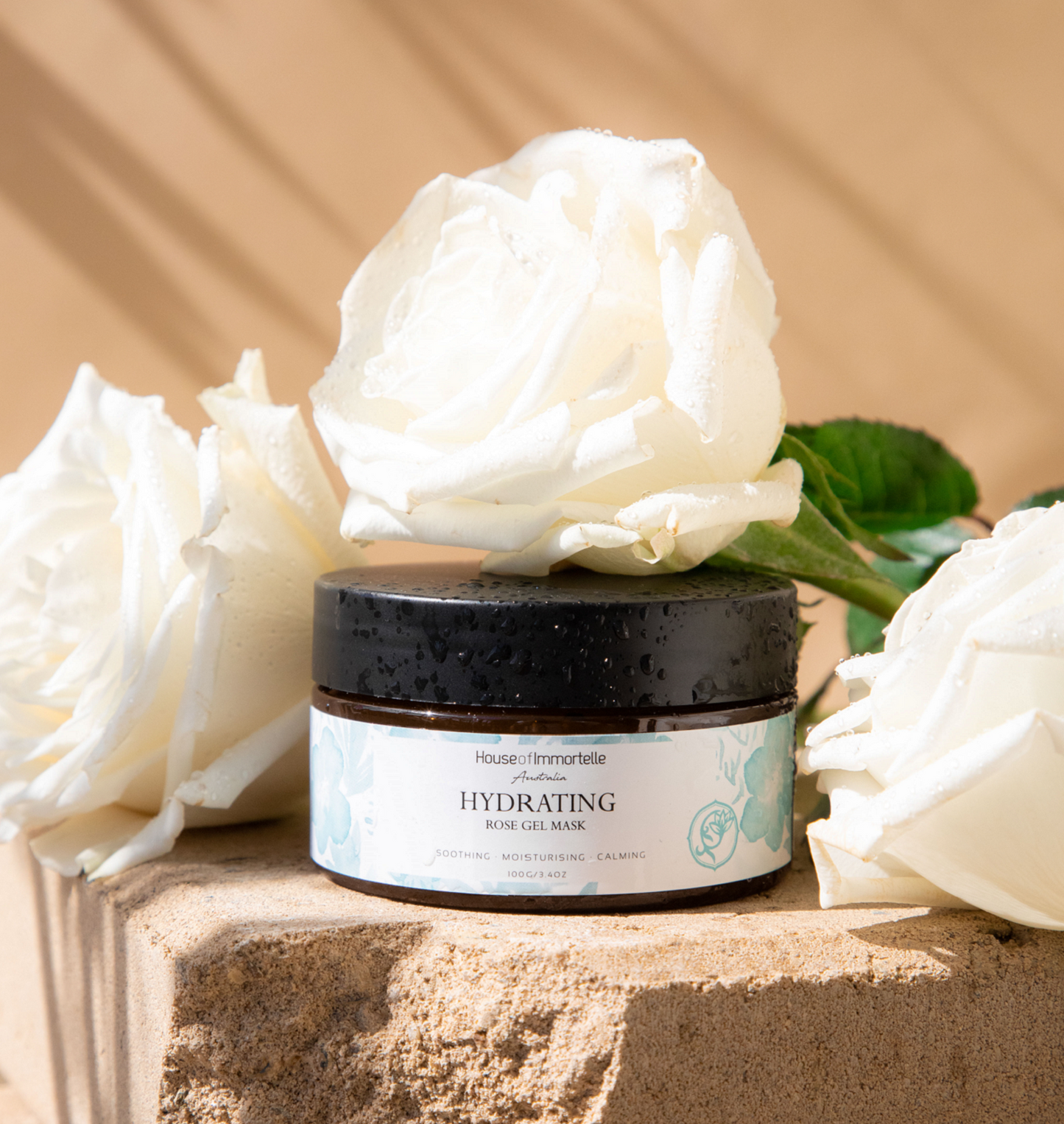 House of Immortelle Bestseller Hydrating Rose Gel Mask in a jar, featuring a refreshing gel formula infused with rose extract. This mask provides intense hydration and nourishment, leaving the skin feeling plump, radiant, and rejuvenated