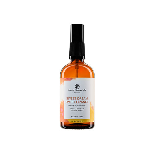 House of Immortelle Sweet Dream Sweet Orange Body Oil in an elegant bottle, infused with a refreshing sweet orange scent. The body oil is designed to hydrate and nourish the skin, with a smooth texture and a minimalist label highlighting its natural, calming ingredients.